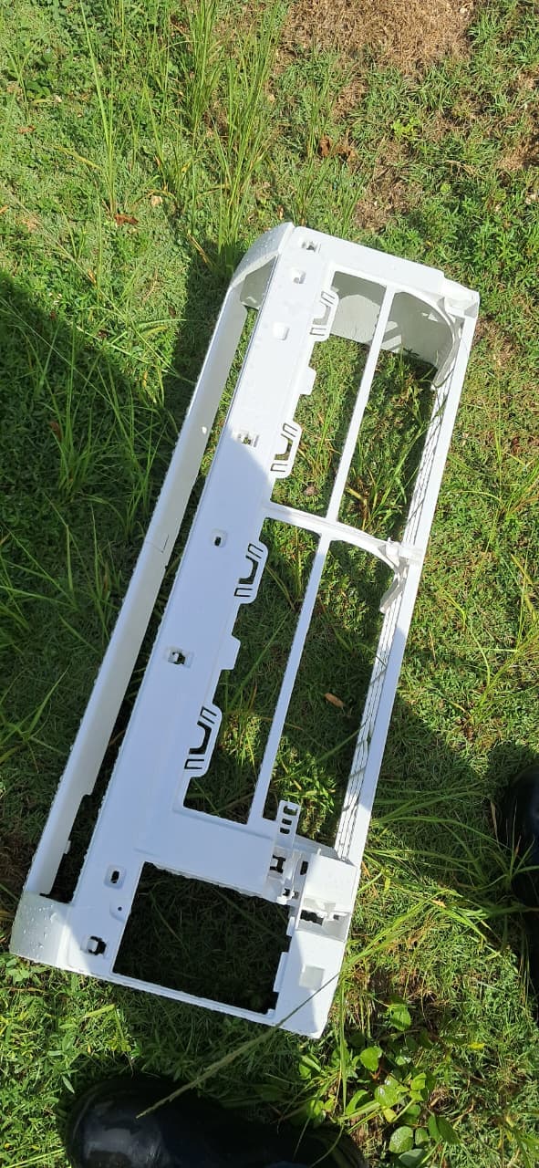 AC front lid casing removed for cleaning